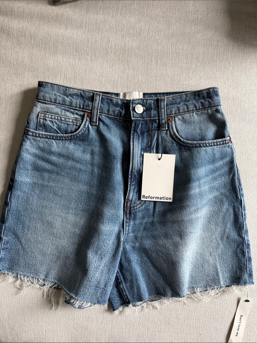 Reformation Medium Blue Raw Hem Denim Shorts